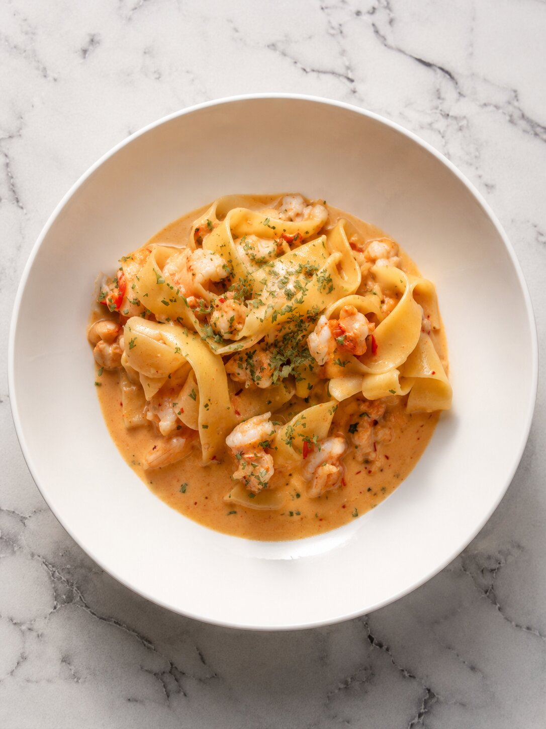 Pappardelle with scampi,calamari in a chilli cream sauce.
